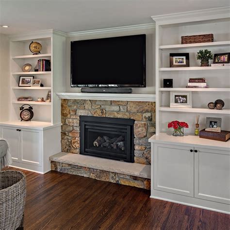 gas fireplace with cabinets